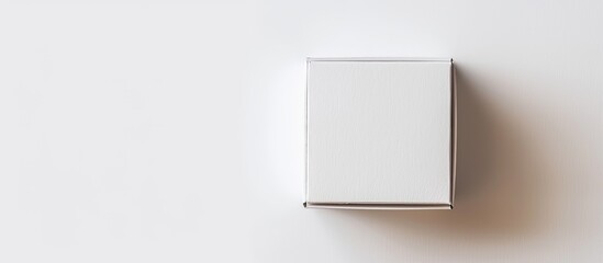 Canvas Print - Textured white cardboard box on a white background with copy space image