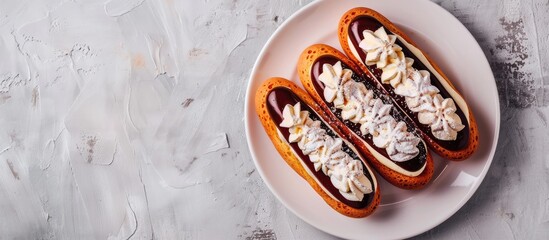 Poster - Top view image of eclair cakes on a white plate with copy space image
