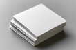 © gabriele - Top view of two white open paper cards on a gray background with soft shadows and space for text