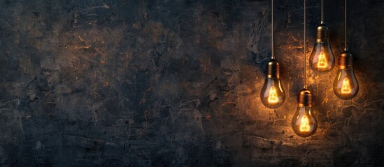 Wall Mural - Light bulbs on a dark backdrop with empty copy space image