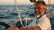 © Dzmitry Halavach - A smiling individual at the helm of a sailboat, enjoying the sunny day on the open sea