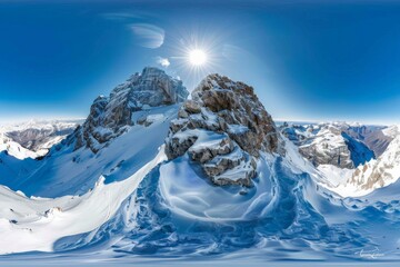 Aufkleber - The sun shines brightly over a rugged, snow-covered mountain peak, highlighting the dramatic, untouched beauty of this pristine and peaceful alpine landscape.