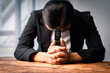 © David - Hands folded in prayer on a Holy Bible in church concept for faith, spirituality and religion, woman praying on holy bible in the morning. woman hand with Bible praying.