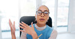 © peopleimages.com - Video call, portrait and business with woman, glasses and explain system in meeting, conversation and talk. Face, agent or worker with eyewear, online communication and presenter for virtual workshop