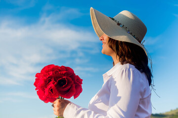 Canvas Print - Girl in a poppy field