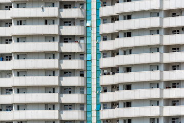 Wall Mural - many windows and walls facade of a modern skyscraper without people