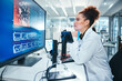© PeakPoints/peopleimages.com - Computer screen, science and thinking with woman in laboratory for development, innovation or research. Analysis, display and pharmaceuticals with scientist at work on medical biology or discovery