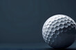 © john - Stylish golf ball isolated on empty dark blue background.
