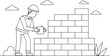 © Designfly - A man is laying bricks in a wall. The man is wearing a hard hat and a shirt. The bricks are being laid in a pattern