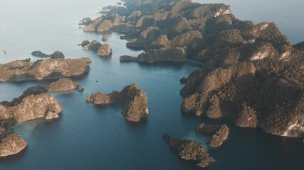 Poster - Aerial view of the islands in the sea. Raja Ampat region, Misool, West Papua, Indonesia