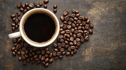 a top view of a hot coffee cup, with coffee beans arranged in a heart shape around it.