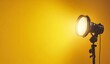 © TigerDude - A yellow background with a spotlight on the right side, creating an atmosphere for film and television production or photography studio advertising.