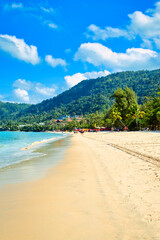 Patong Beach, Thailand, March 2022 . The beach was very quiet due to the Covid 19 pandemic. But the weather was sunny and the beach and sea was very clean and tropical and extremely hot. 