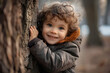 © Daniel - Small boy child hugging tree