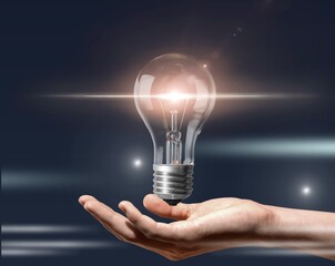 Wall Mural - hand holding bright light bulbs