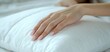 © Антон Сальников - Sexy female hand squeezing and pulling white sheets. Tender woman hand with sensual manicure. Sexy, pleasure and erotic concept.