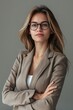 © Cloudyew - Confident Young Professional Woman in Business Attire with Glasses