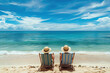 © Valeriia - Relax chill traveling advertisement, retirement, life after work, vacation time concept. Adult couple wearing hats sit in beach chairs on the beach sand looking at the azure sea ocean water