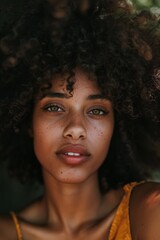 Poster - Bold stare of an Afro-Latino activist advocating for change through the camera.