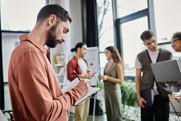 Wall Mural - Professionals engage thoughtfully during a challenging workplace transition.