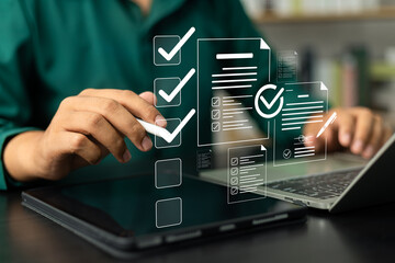 Canvas Print - Business performance monitoring and evaluation concept, Take an assessment, Business man using laptop and tablet online checklist survey, Filling out digital checklist, Questionnaire with checkboxes.