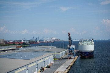 View of Baltimore, Maryland from a cruise ship. 
Scenic ocean, buildings, and ships.