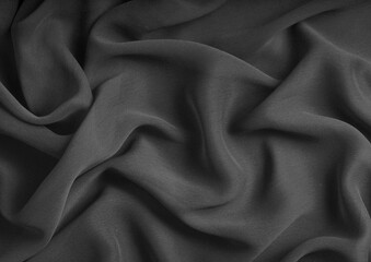 Deep blue glossy cloth texture background. Natural textile material photo, pattern cover. Black and white monochrome grayscale photo