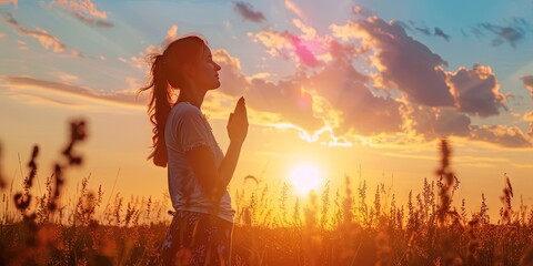 Wall Mural - woman praying, sunset, standing,