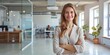 © Cloudyew - Business girl in a modern office with clear space for advertising.