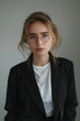© Cloudyew - Professional woman with a clean, minimalist look.