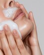 © Steveandfriend - Beauty and cleanser Woman washing her face with a gentle cleanser, highlighting habitual skincare