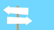 © MAHIJO - Wooden  signpost with two blank directional arrows pointing left and right on a blue background. Two directions road sign indicating two different and opposite paths.