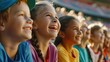 © Johannes - Group of happy children watching together a sports event in the stadium