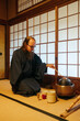 © Branislava Zivic Zrnic/Stocksy - Tourist perform tea ceremony in japanese tea house