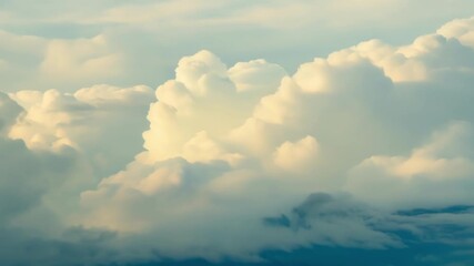 Wall Mural - soft hues of orange and pink blend as clouds gracefully float across the evening sky, creating a tra