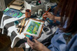 © Anna Artemenko/Stocksy - hands of an artist who paints a picture