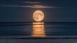 © starush - A full moon rising over the ocean with a beach in view, AI
