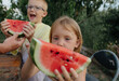 © Anna Artemenko/Stocksy - children holding watermelon slices