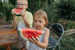 © Anna Artemenko/Stocksy - children holding watermelon slices