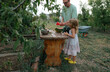 © Anna Artemenko/Stocksy - girl and father eating watermelon