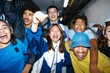© BONNINSTUDIO/Stocksy - Group of friends screaming celebrating victory