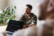 © Nuria Seguí/Stocksy - Colleagues At Office Of Tech Startup
