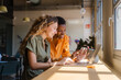 © Nuria Seguí/Stocksy - Diverse Female Entrepreneurs Working Together In Modern Workplace