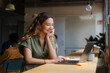 © Nuria Seguí/Stocksy - Female Entrepreneur Working On Laptop In Modern Workplace