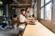 © Nuria Seguí/Stocksy - Entrepreneurs Working Together In Office Of Tech Startup