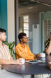 © Nuria Seguí/Stocksy - Teamwork In A Meeting In Modern Workplace