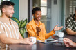 © Nuria Seguí/Stocksy - Teamwork In A Meeting In Modern Workplace