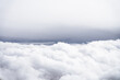© Justin Mullet/Stocksy - Thick white cloud bank from above