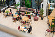 © Luis Velasco/Stocksy - Business Meeting In Open Office