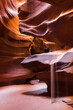 © Andreas Wonisch/Stocksy - Sand flowing in in Upper Antelope Canyon
